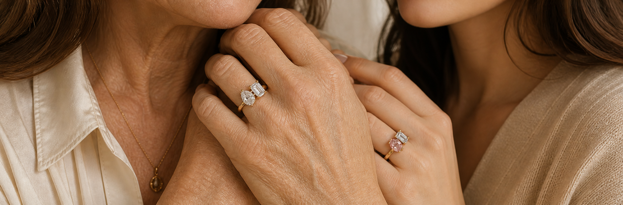 Mother and adult daughter wearing personalized two stone diamond rings