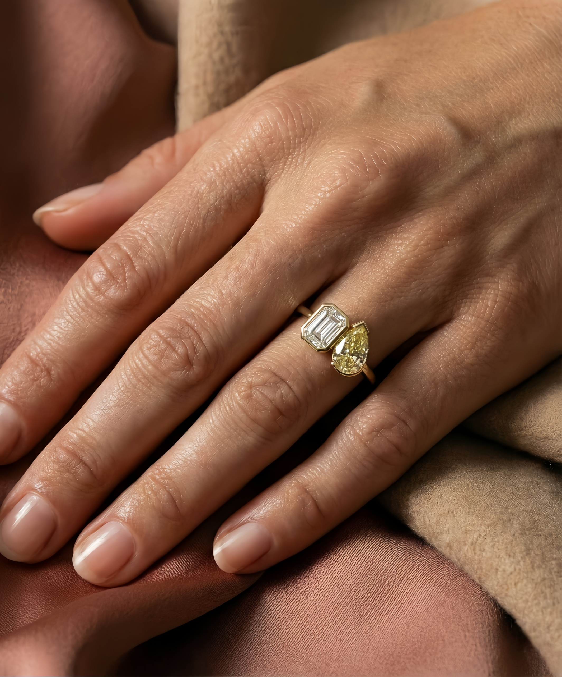 Yellow and colorless two stone diamond ring worn as a meaningful jewelry gift